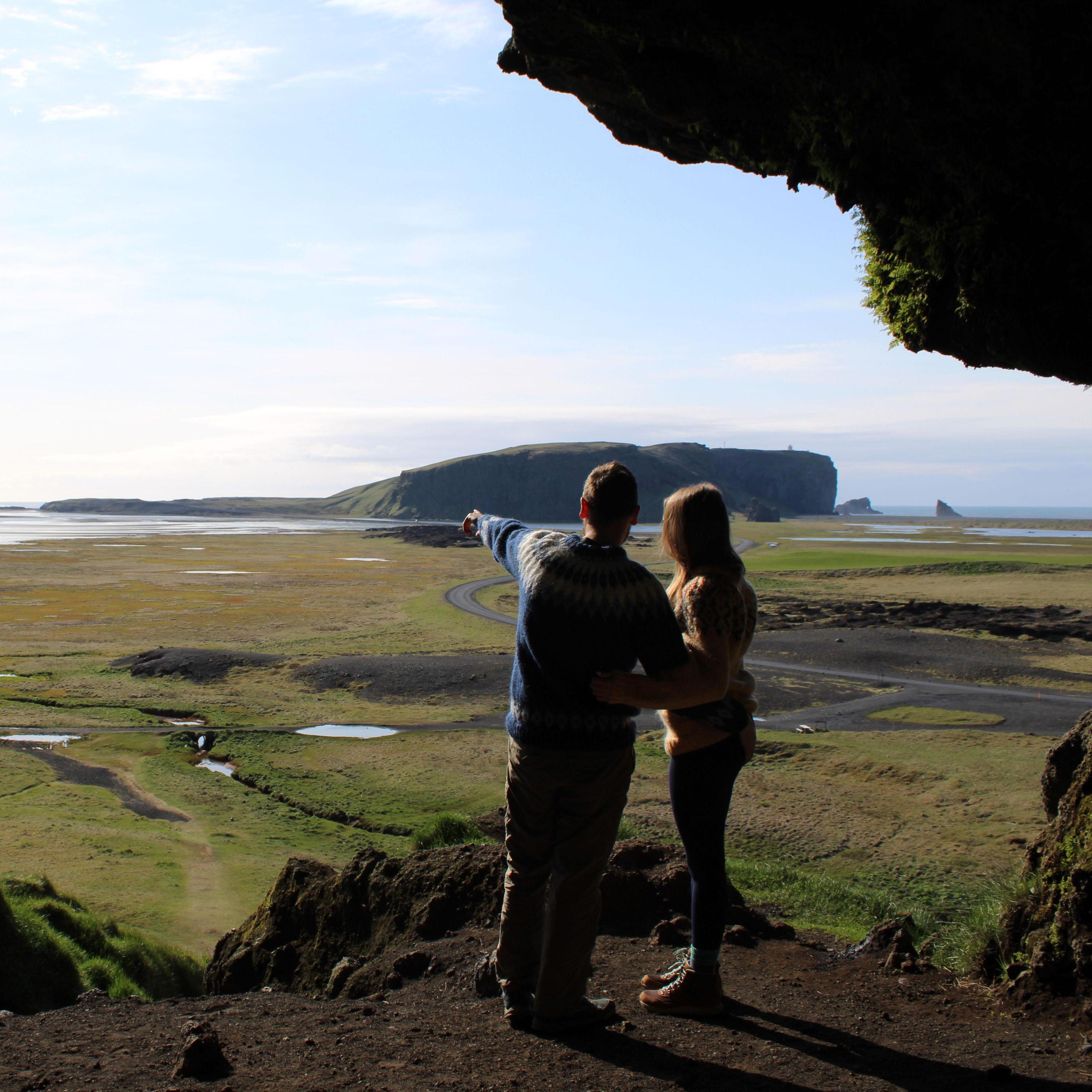 Josh pointing out why Loftsalahellir - this Icelandic cave - was the perfect proposal spot