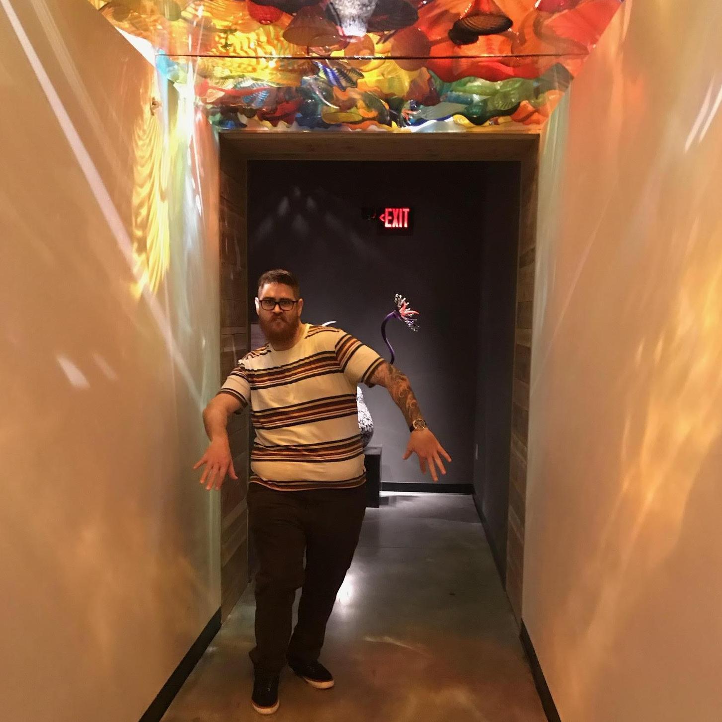 One weekend in December, we took a long weekend and ended up going to the Chihuly museum in DTSP! Stephen struck this funny pose before taking a nice picture, so of course we're posting this one!
