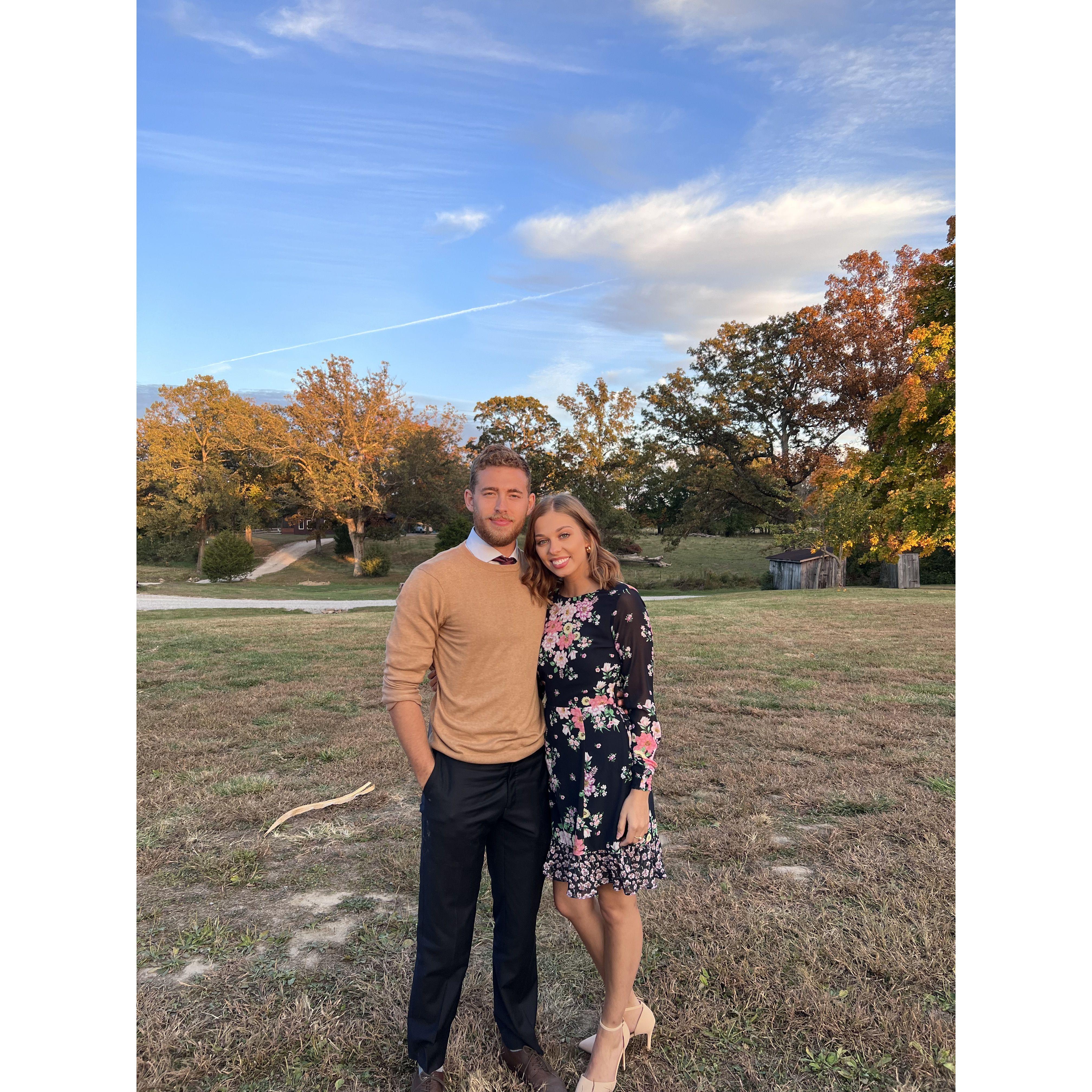 Our first photo together at a friend's wedding