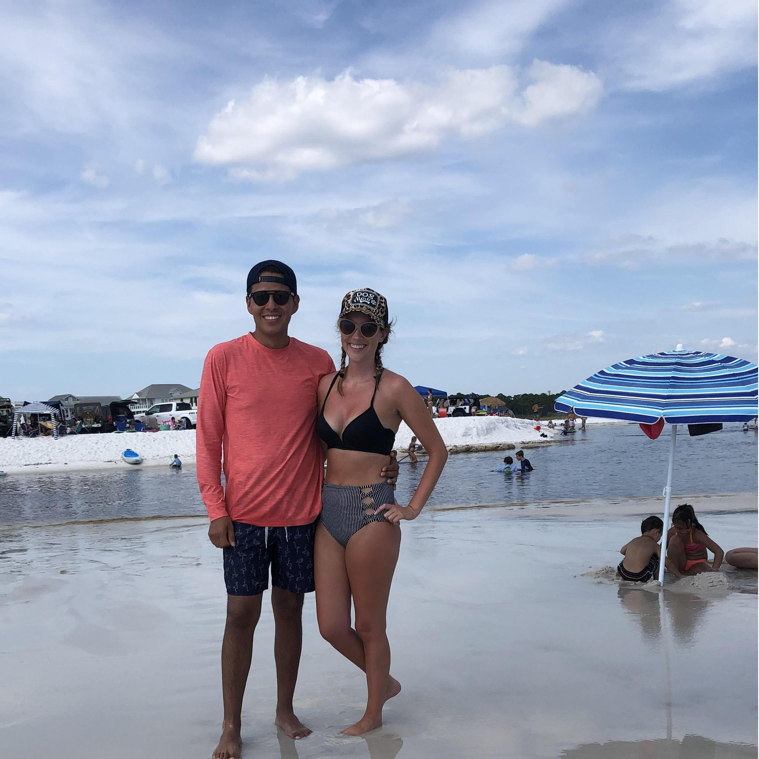 Fun day at the beach. He carried me around because I had a broken foot