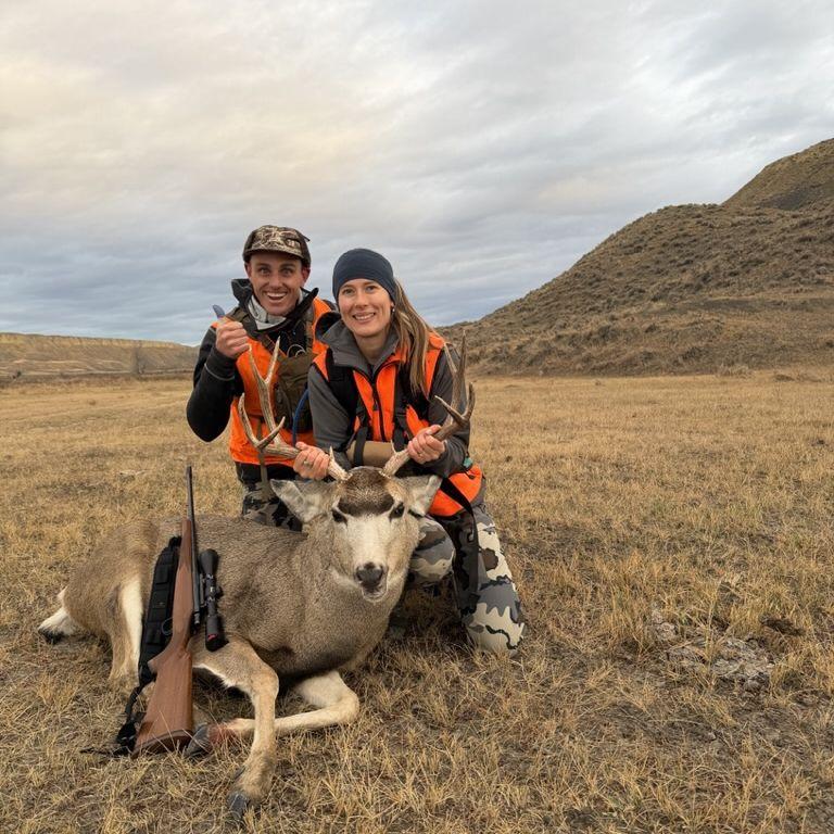 Kira's first Mule deer with Trenton as her guide (BBD-big buck down!)