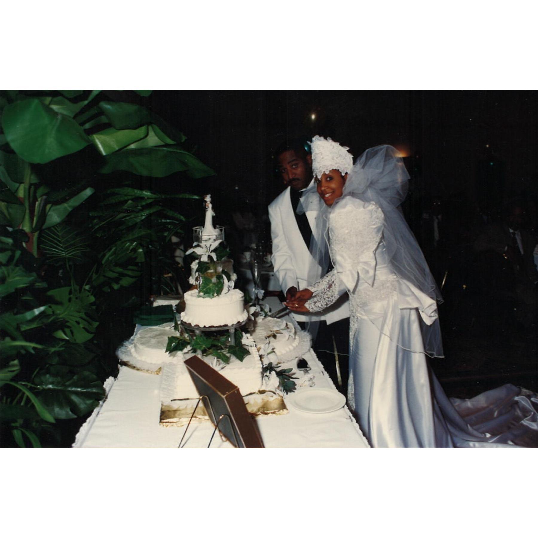 It's time for cake! Our BEAUTIFUL cake was done by Mrs. Cassaundra Easton. The one year anniversary cake tasted just as delicious as on our wedding day!!