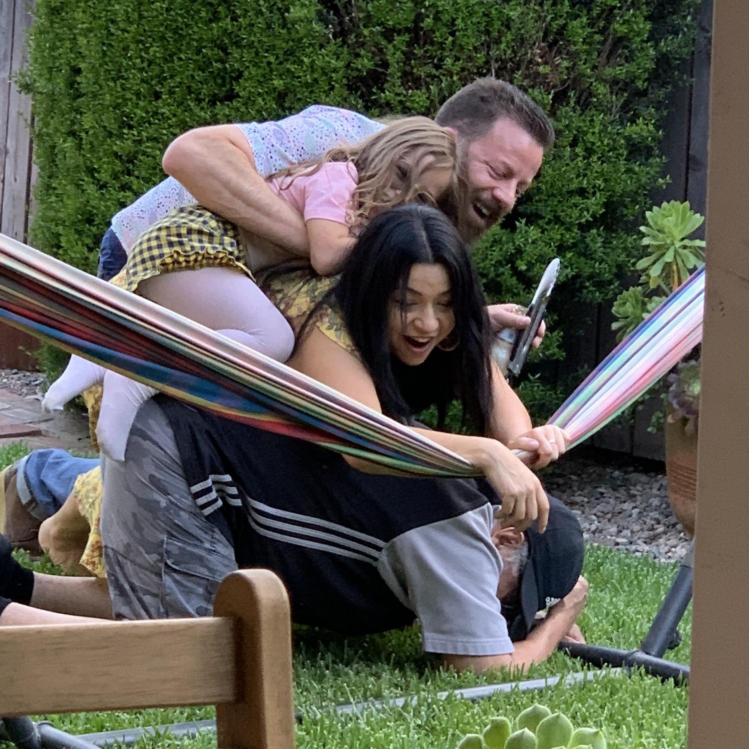 Dog pile on Grandpa Frank