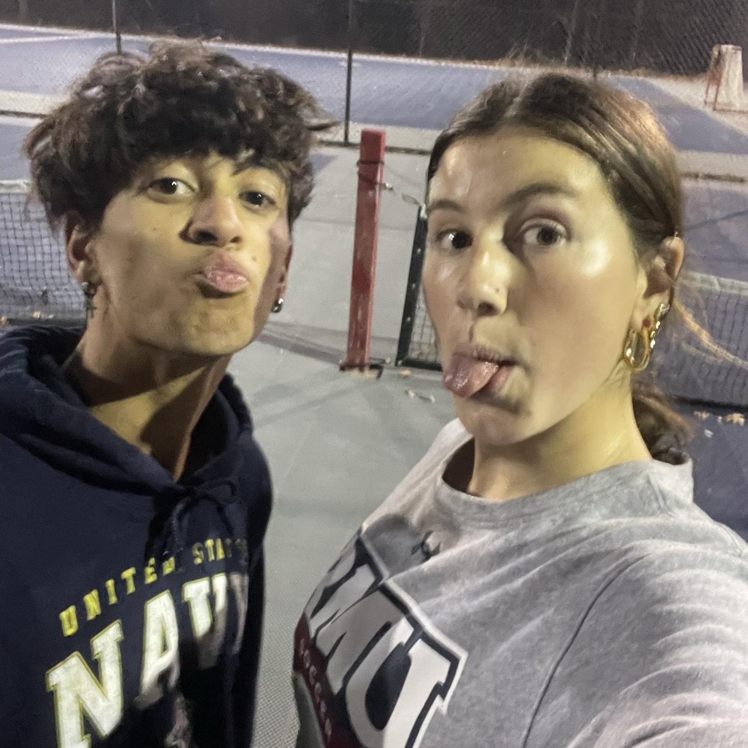This was a week before Nae tore her ACL. We played soccer tennis because we love competing with each other. Nae won two games, Gabe won 1. So Nae WON.