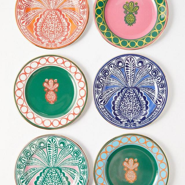 La DoubleJSet of six 18kt-gilded porcelain dessert plates