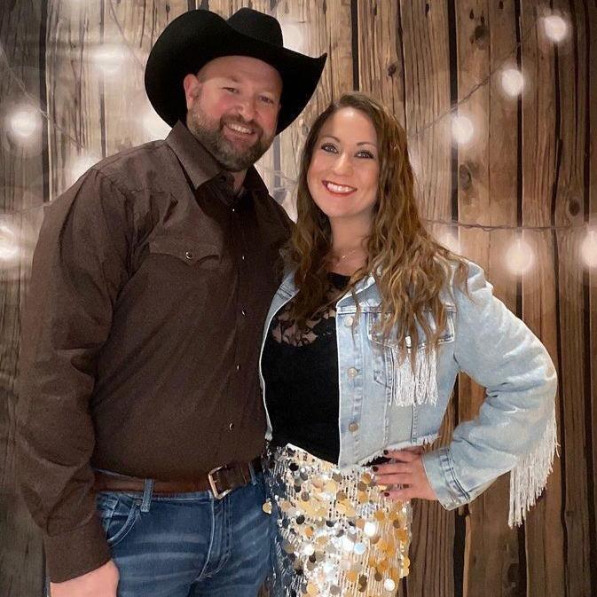 At the Boots & Bling work Event, Robyn co-hosted.