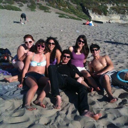 An old photo of us lounging with friends at Natural Bridges beach our sophomore year of college.