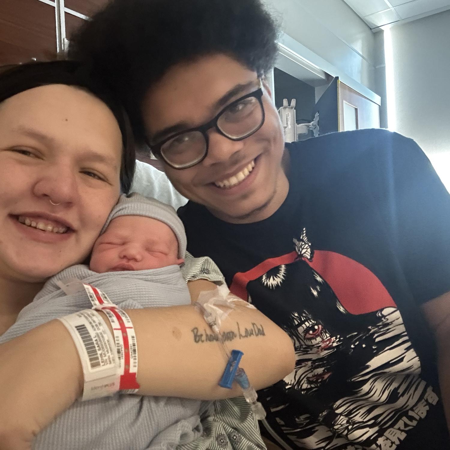 Our first family photo mommy daddy and Magnus