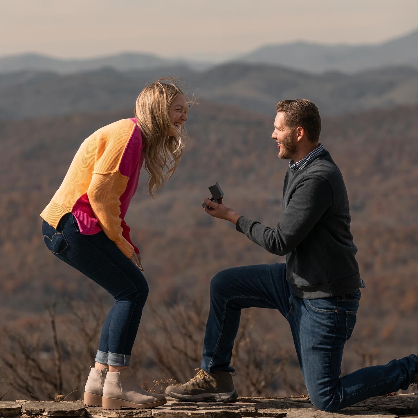 The moment Carter proposed! Emily is so thankful he had a photographer capture this once in a lifetime moment!