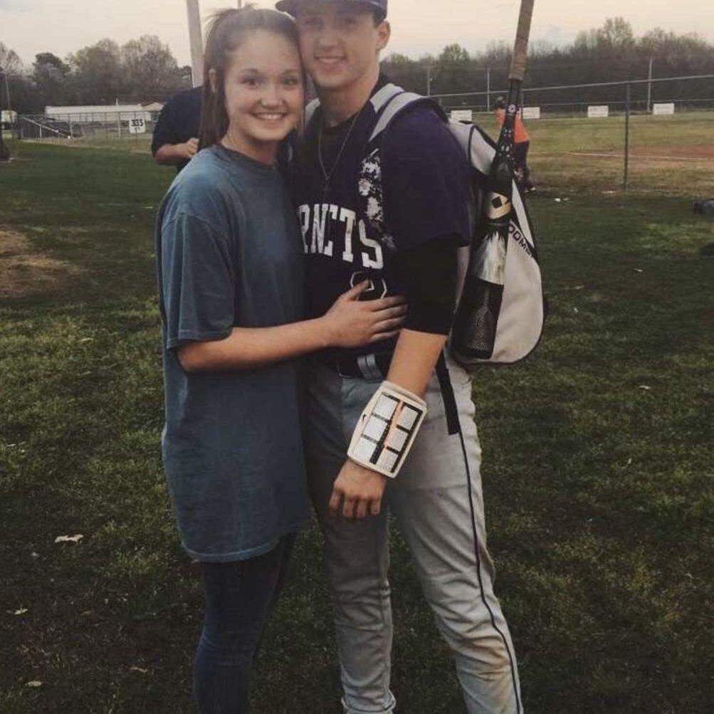 One of our first photos together, taken at the place we first met.