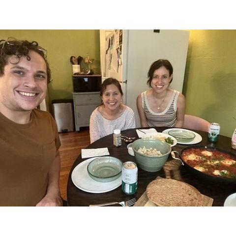 Our first picture together, before we were dating! Making shakshuka with Diana.