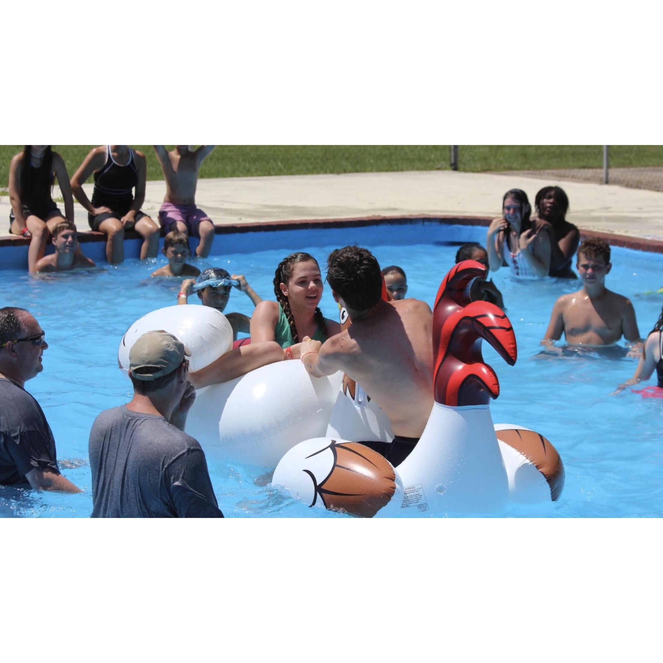 While we were working at Beech Street First Baptist Church in Texarkana in the summer of 2018, we both went to the student ministry camp. We had an intern vs. intern chicken fight in the pool.