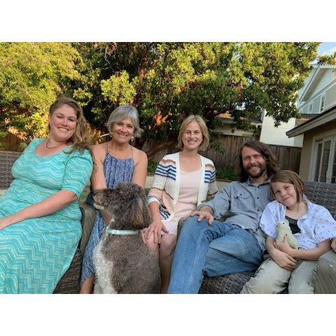 A summertime family photo with Amy's family.