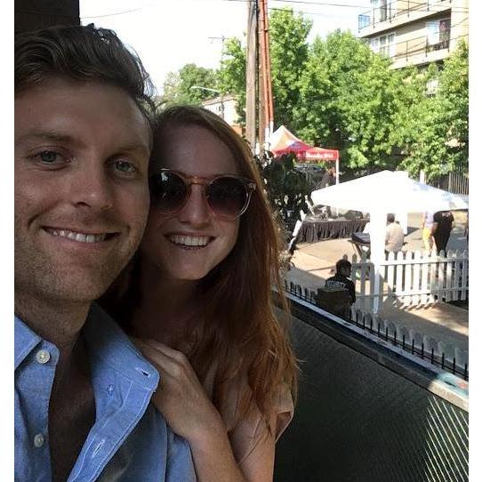 We met in Seattle and this is a picture of us on the balcony of our first apartment in Capitol Hill. We loved living next door to top pot doughnuts and some of our favorite restaurants and bars.