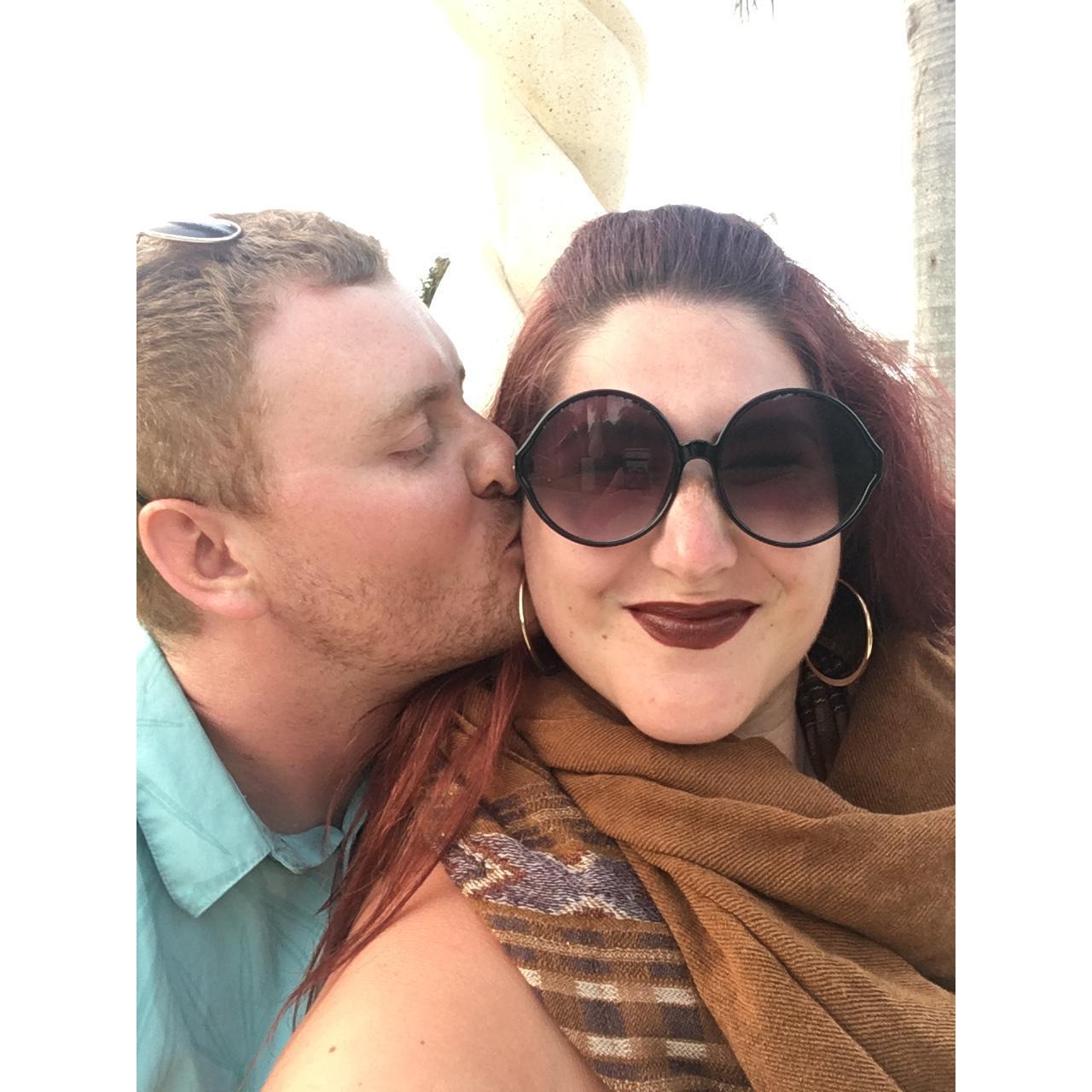 We love to travel, but we also love to gross out everyone else on vacation by kissing each other in selfies at least once an hour