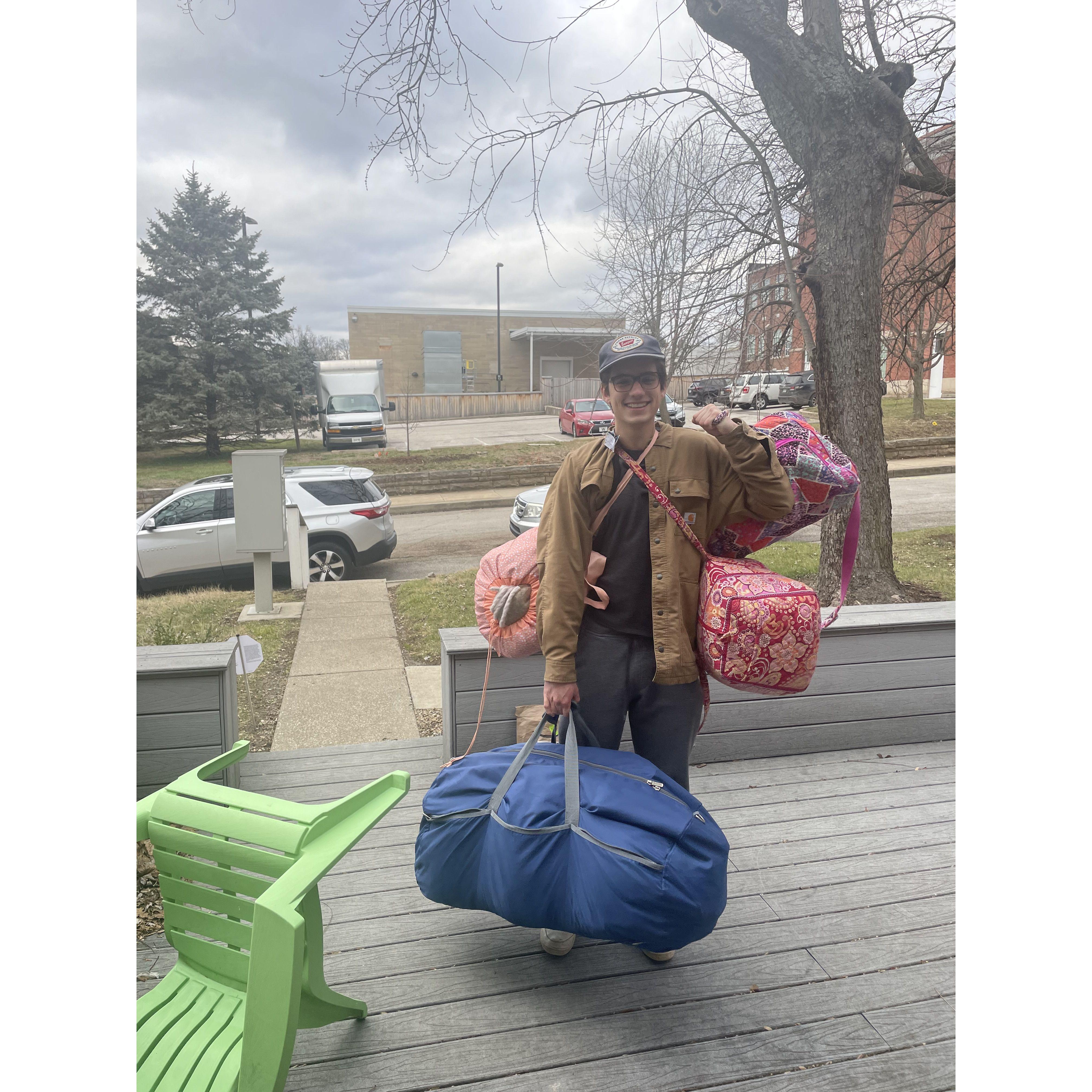 Cam helping me with my weekend bags….
