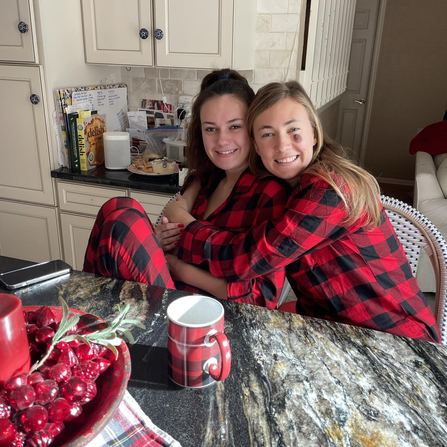 Christmas pajamas are a must at the Dickie Christmas. Kennedy and Morgan in the kitchen on Christmas morning.