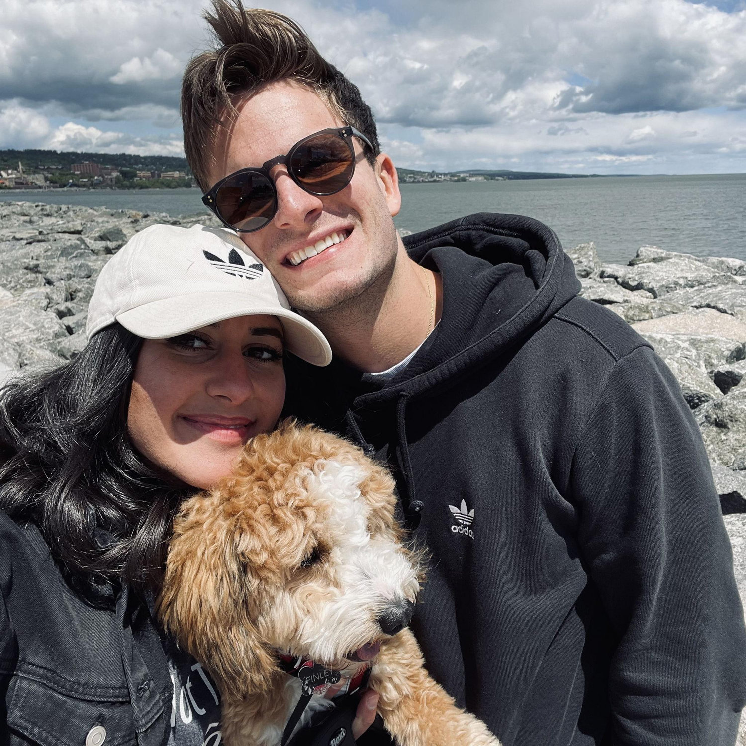 Family photo in front of Lake Superior! One of Todd's many visits to Duluth when Mariam lived there for her first on-air reporting job.