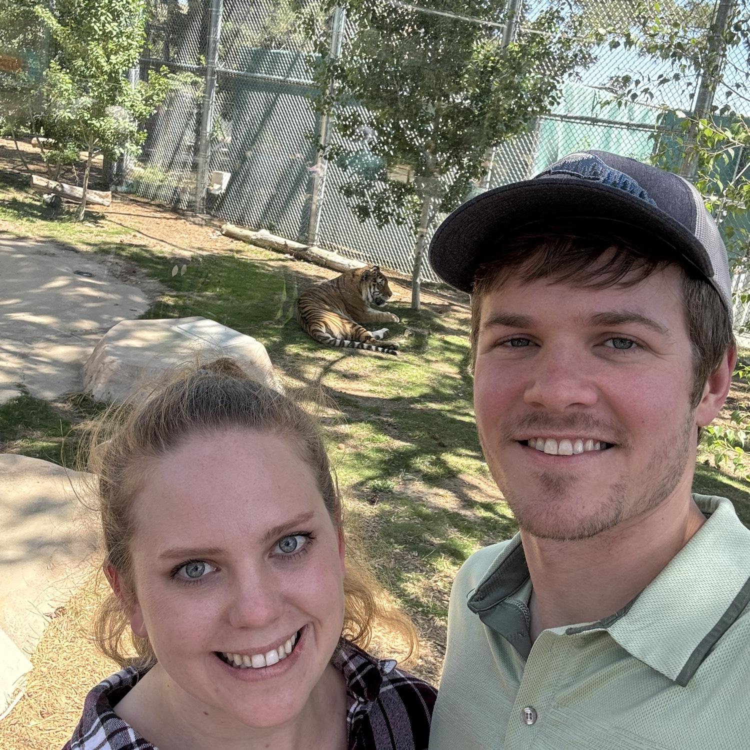 Spending time at the zoo - we took a picture with the tiger here!
