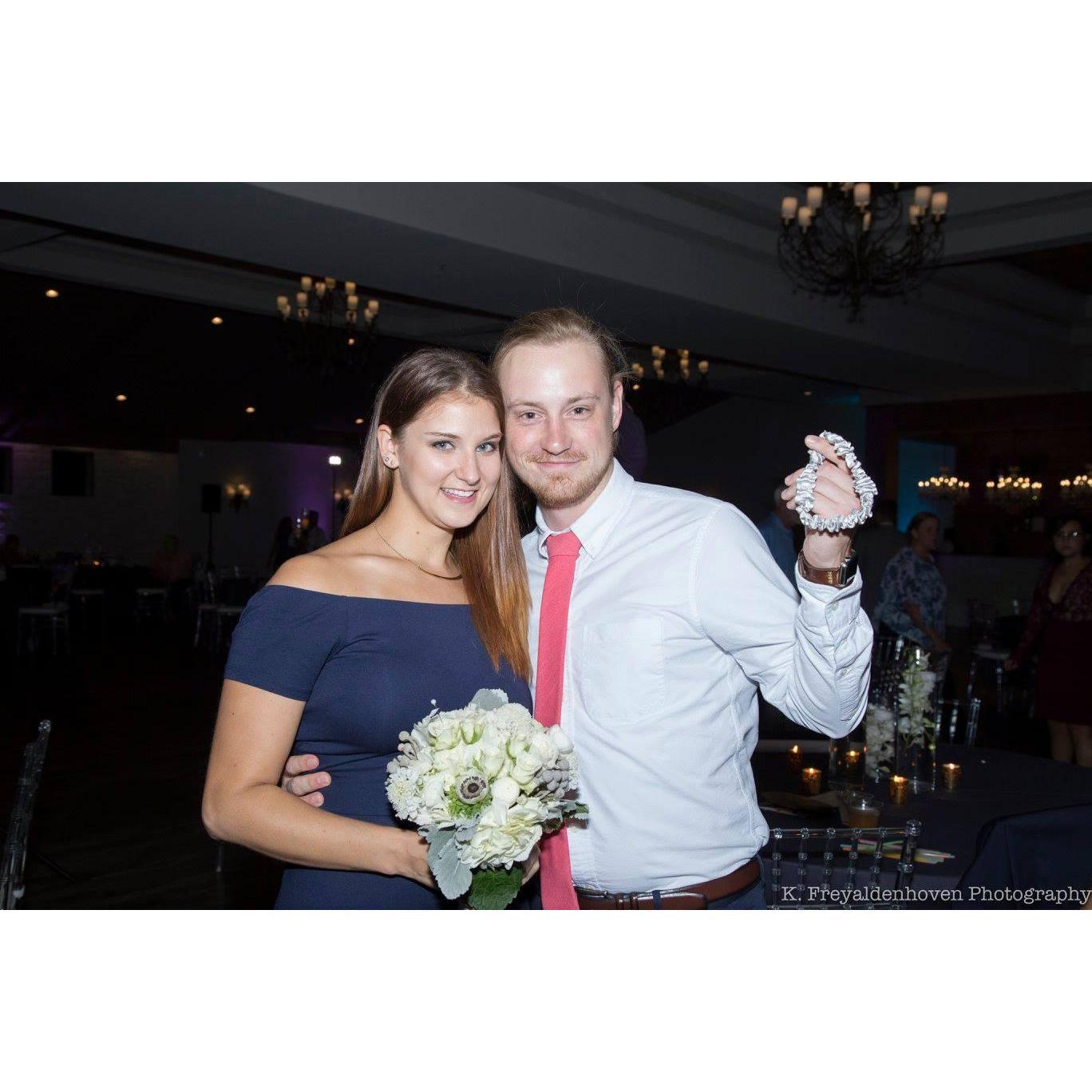 We caught the bouquet and garter at our friend's wedding... hint hint!