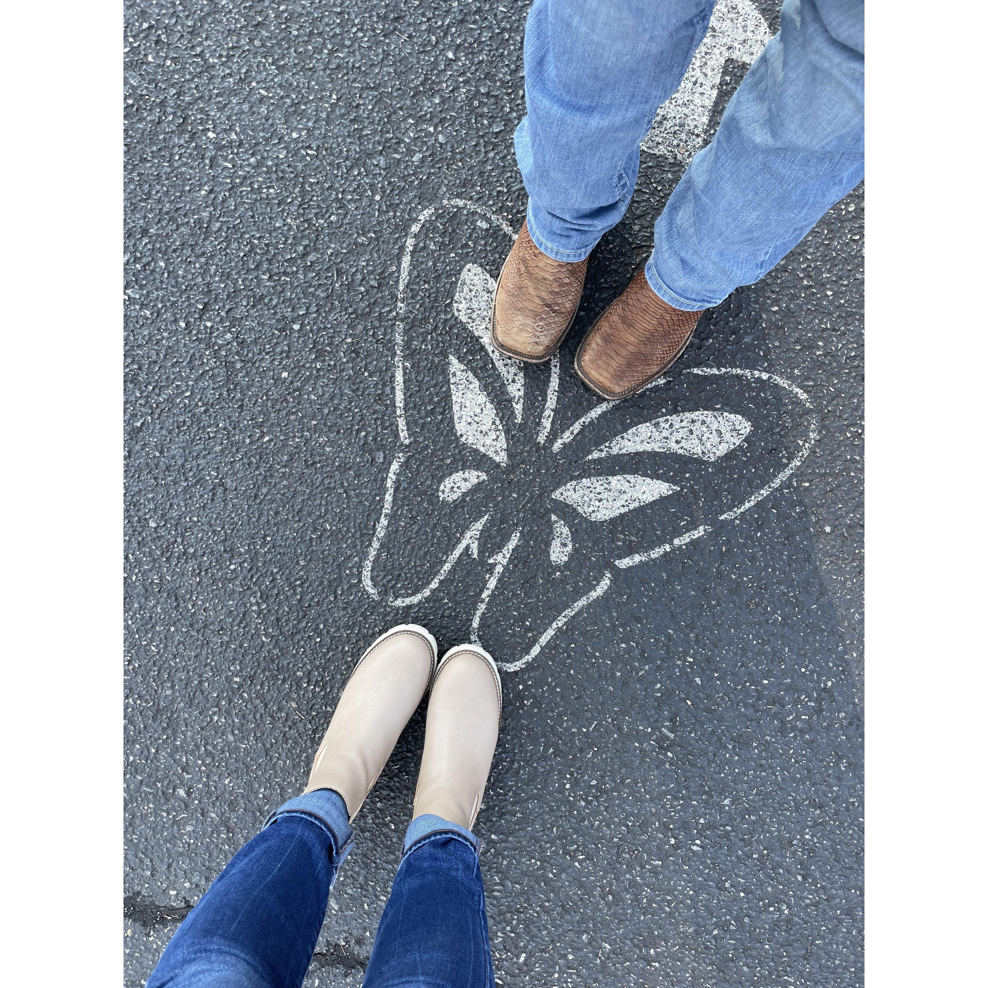 In the parking lot of Dollywood...about to get engaged without knowing