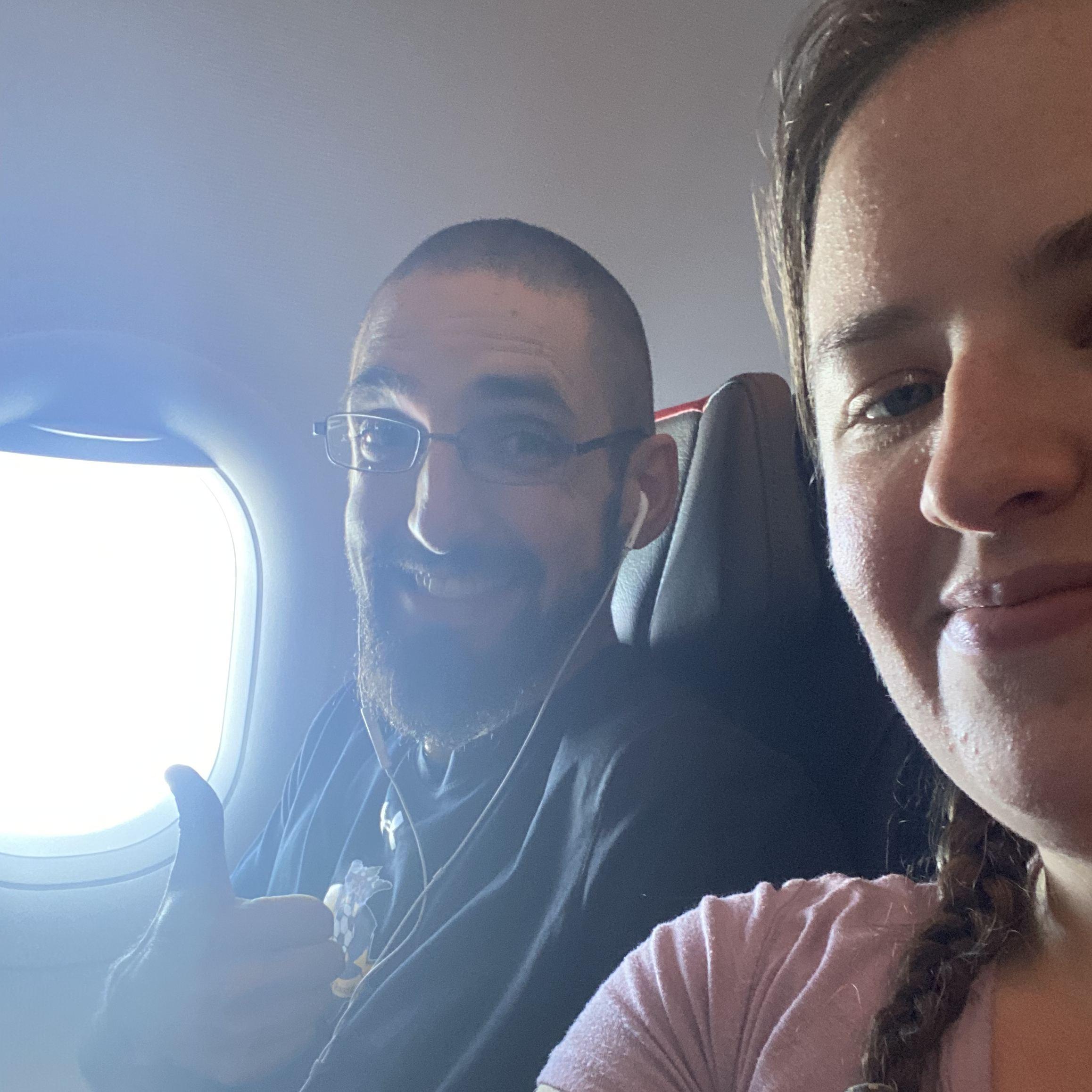 His first ever plane ride to AZ for my graduation