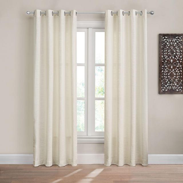 Design Solutions Caleb 84-Inch Solid Grommet Light-Filtering Window Curtain Panel in Ivory
