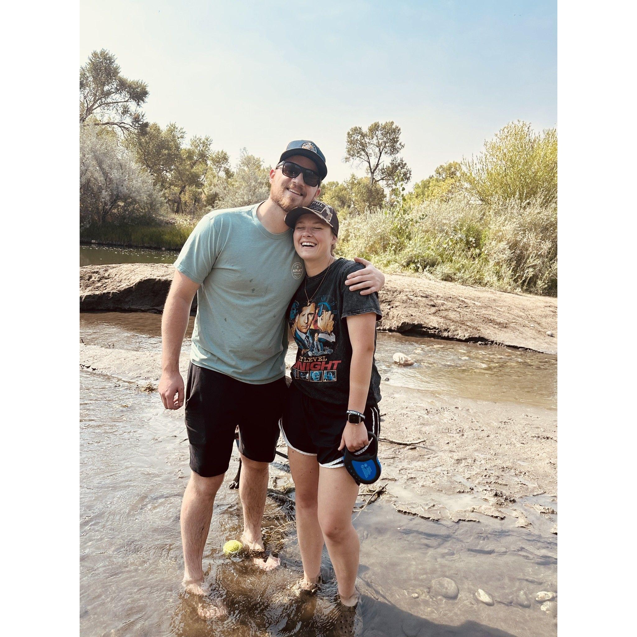 Walking the Yellowstone River in Montana with Rev who cared more about the tennis ball than a family picture.