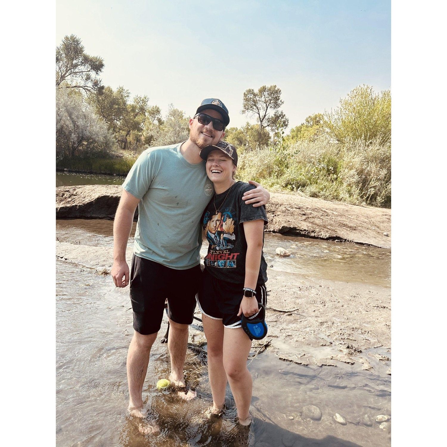 Walking the Yellowstone River in Montana with Rev who cared more about the tennis ball than a family picture.