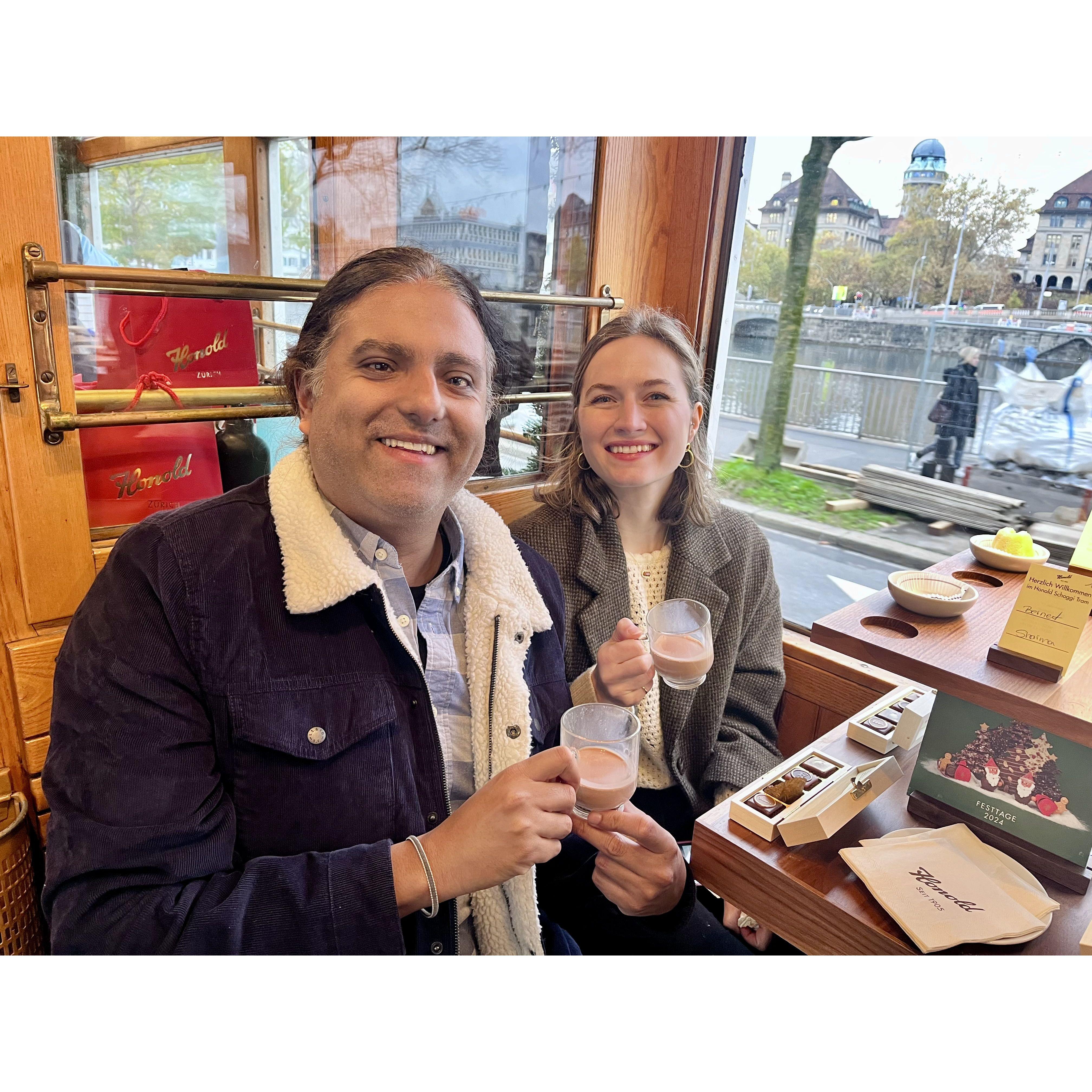 Sipping hot chocolate on a Christmas train in Switzerland.