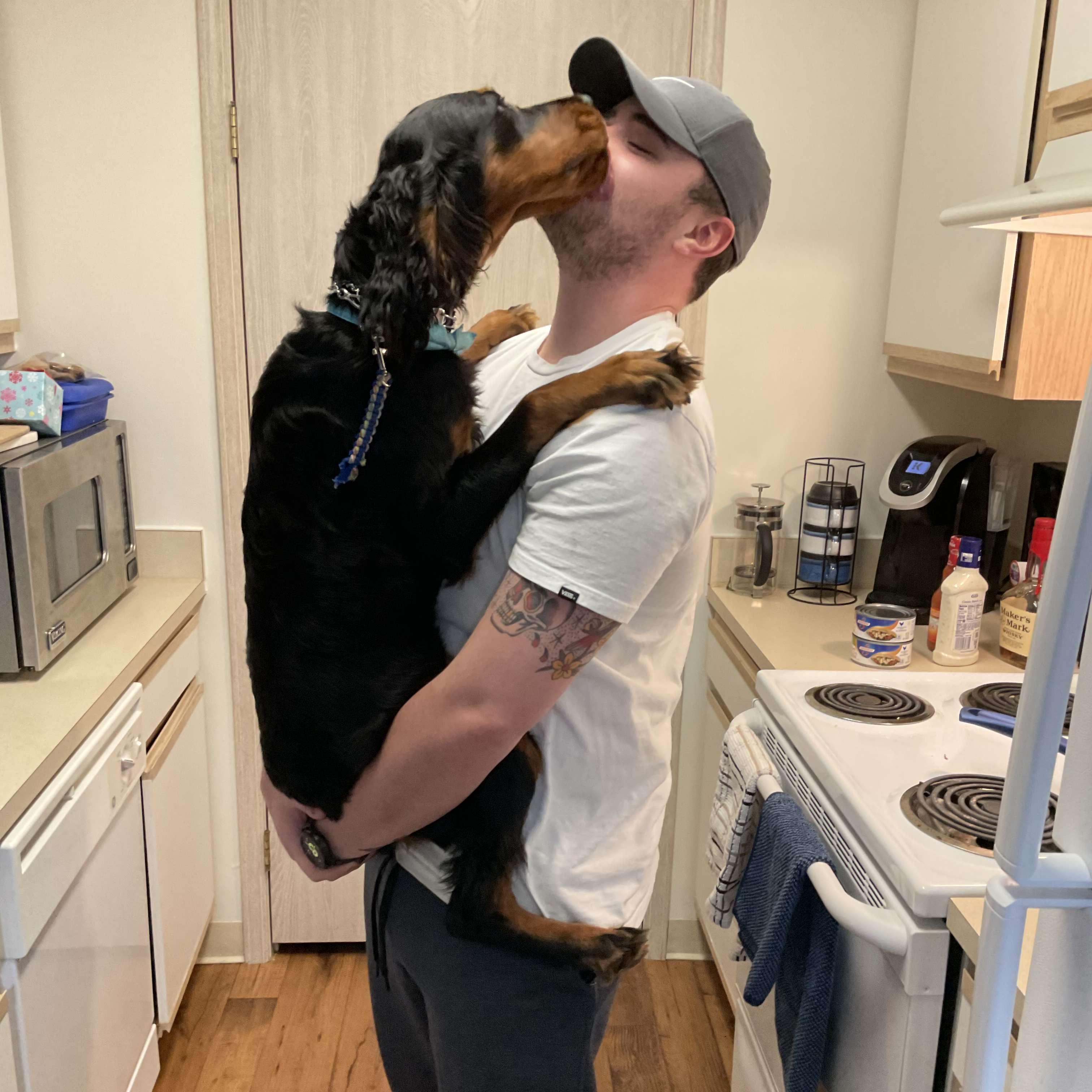 Josh and Rooney loved to share kisses in our first apartment.