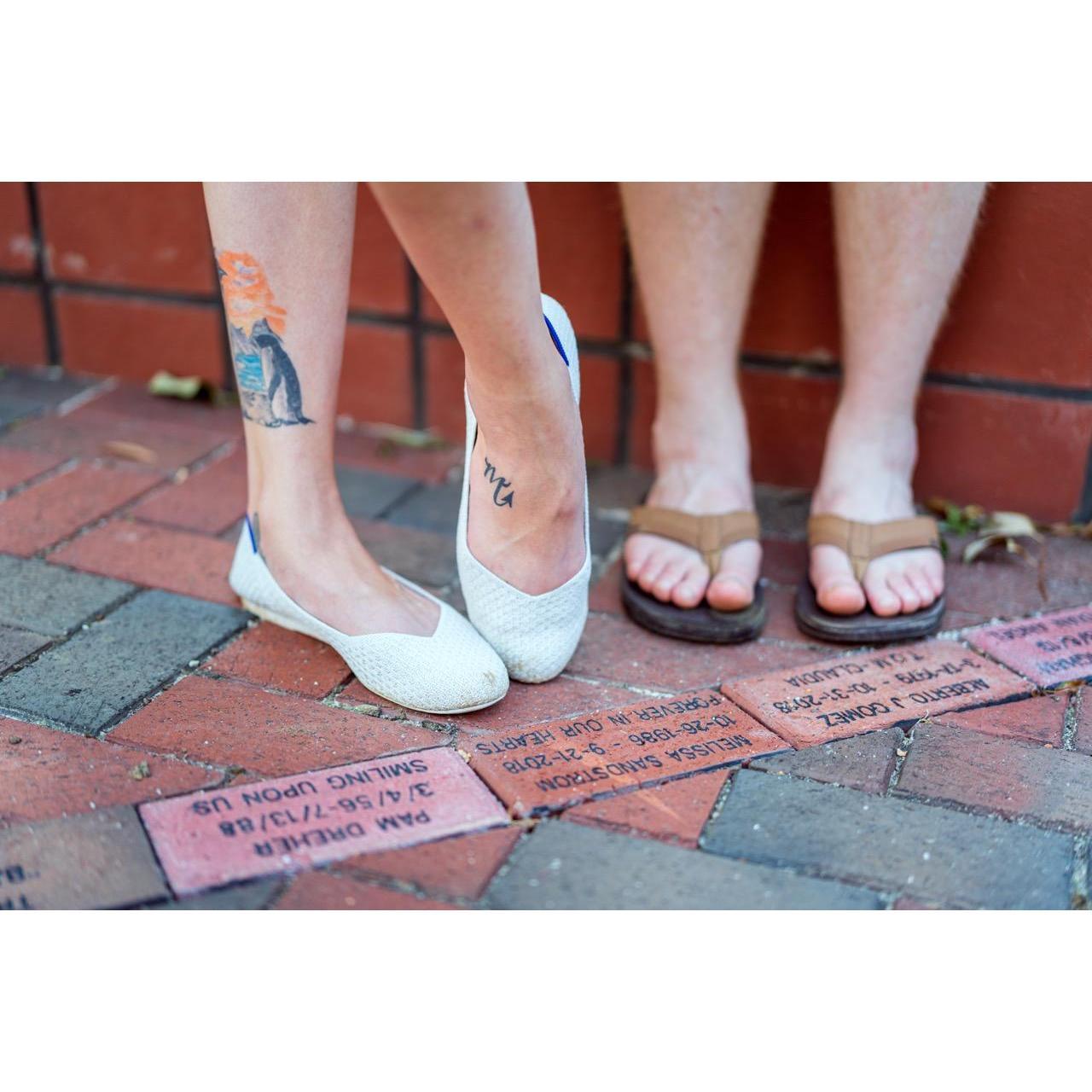 Our feet (ignore Ian's flip flops at his request) by Melissa's brick in downtown Raleigh