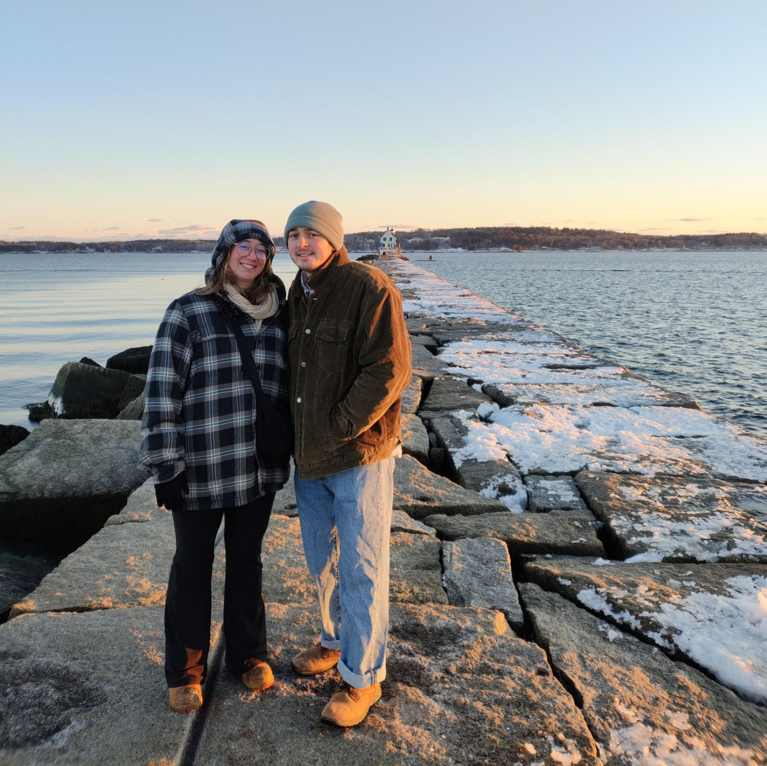 Us at the never ending bridge to a lighthouse in Maine