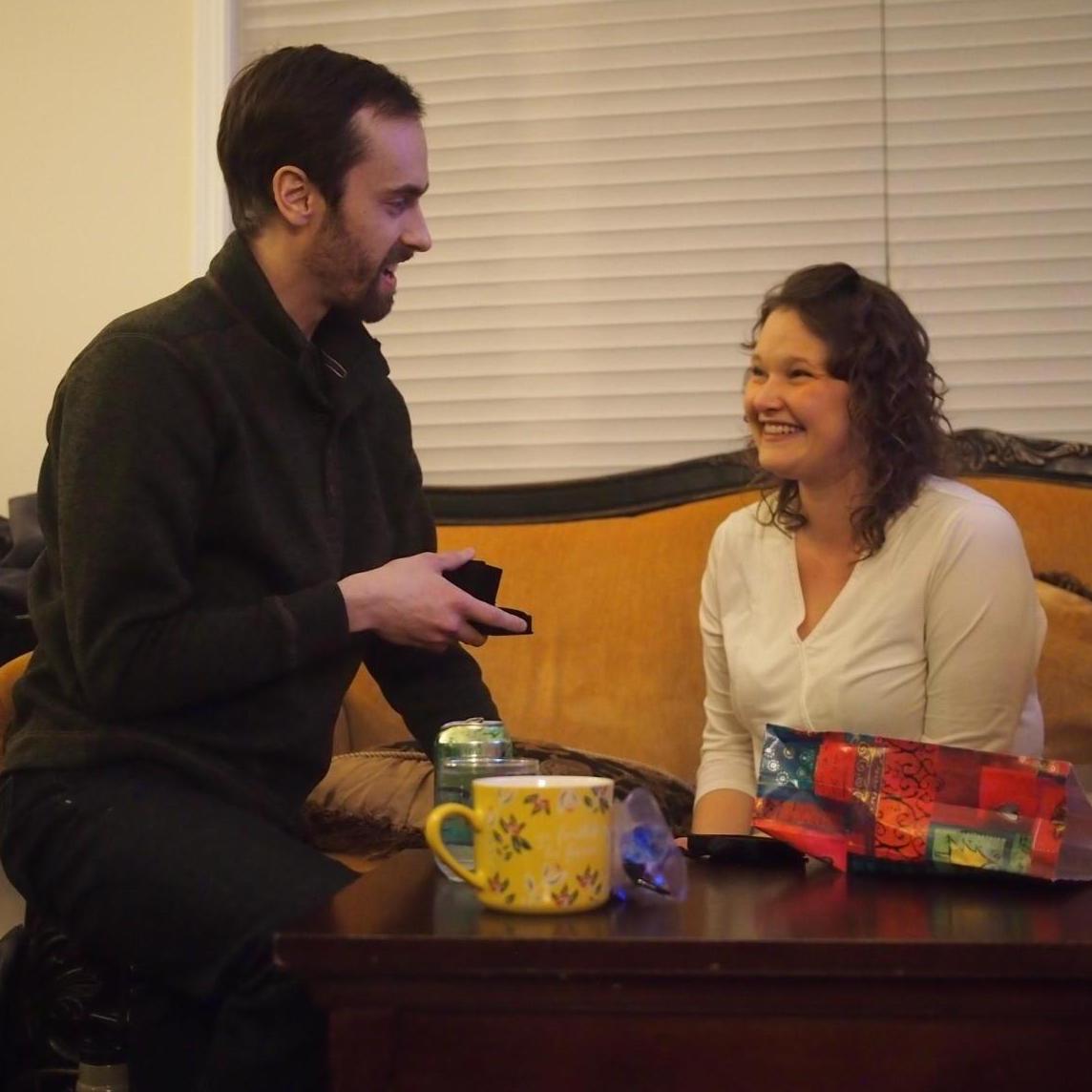 Adam proposed on Christmas Eve, it came as a surprise as he threw in a "mock gift" and then brought out the ring in a gift bag.