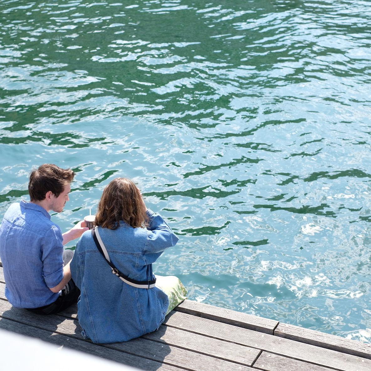 A passing-by photographer in Switzerland snapped a photo of Ross & Maddie eating ice cream along the Limmat.