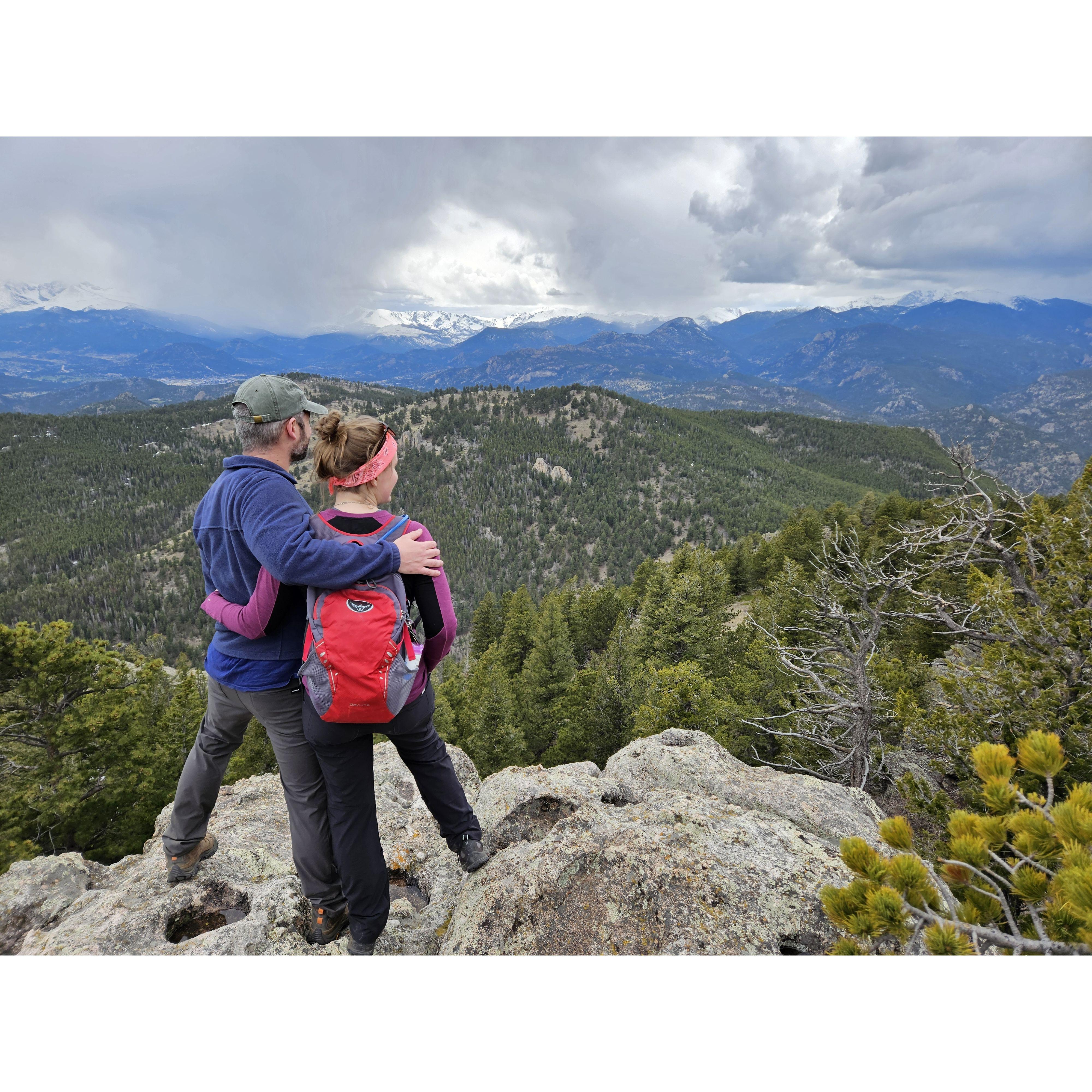 Mike loves long, strenuous grueling hikes in the Rocky Mountains. Jenn.... Well, she loves Mike so she makes it work!