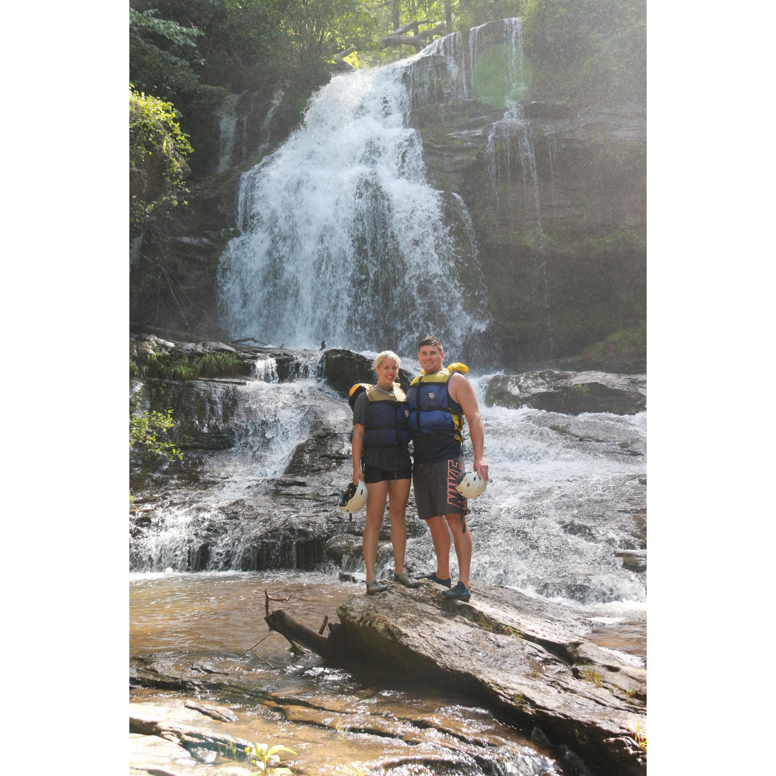 Waterfall hiking break during white water rafting.