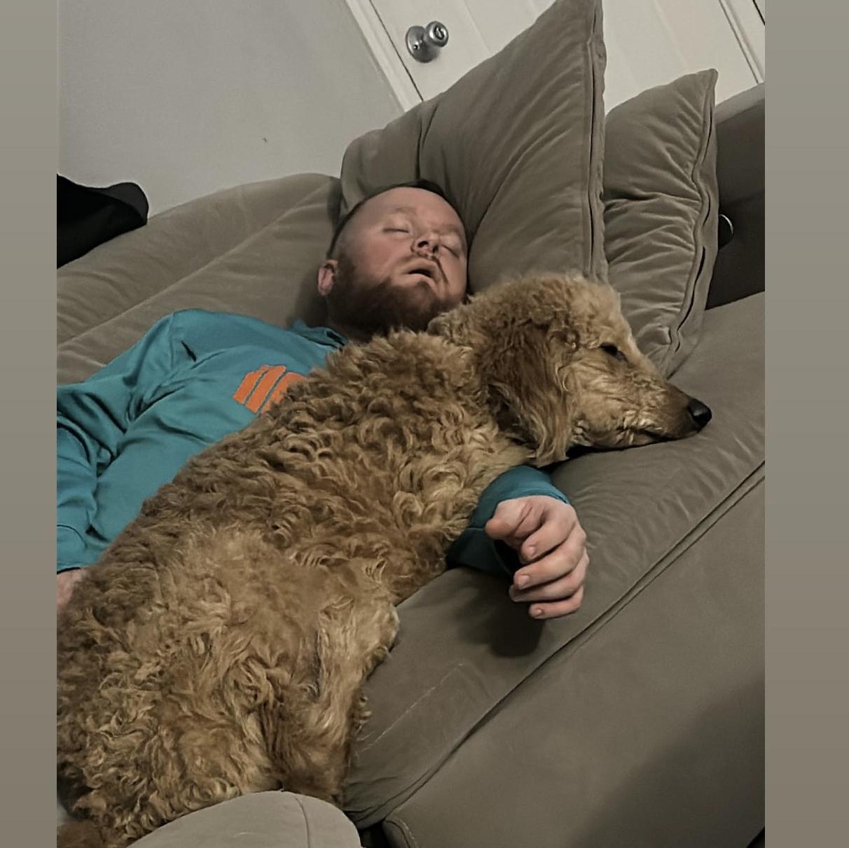 Mallie loves snuggling her dad.