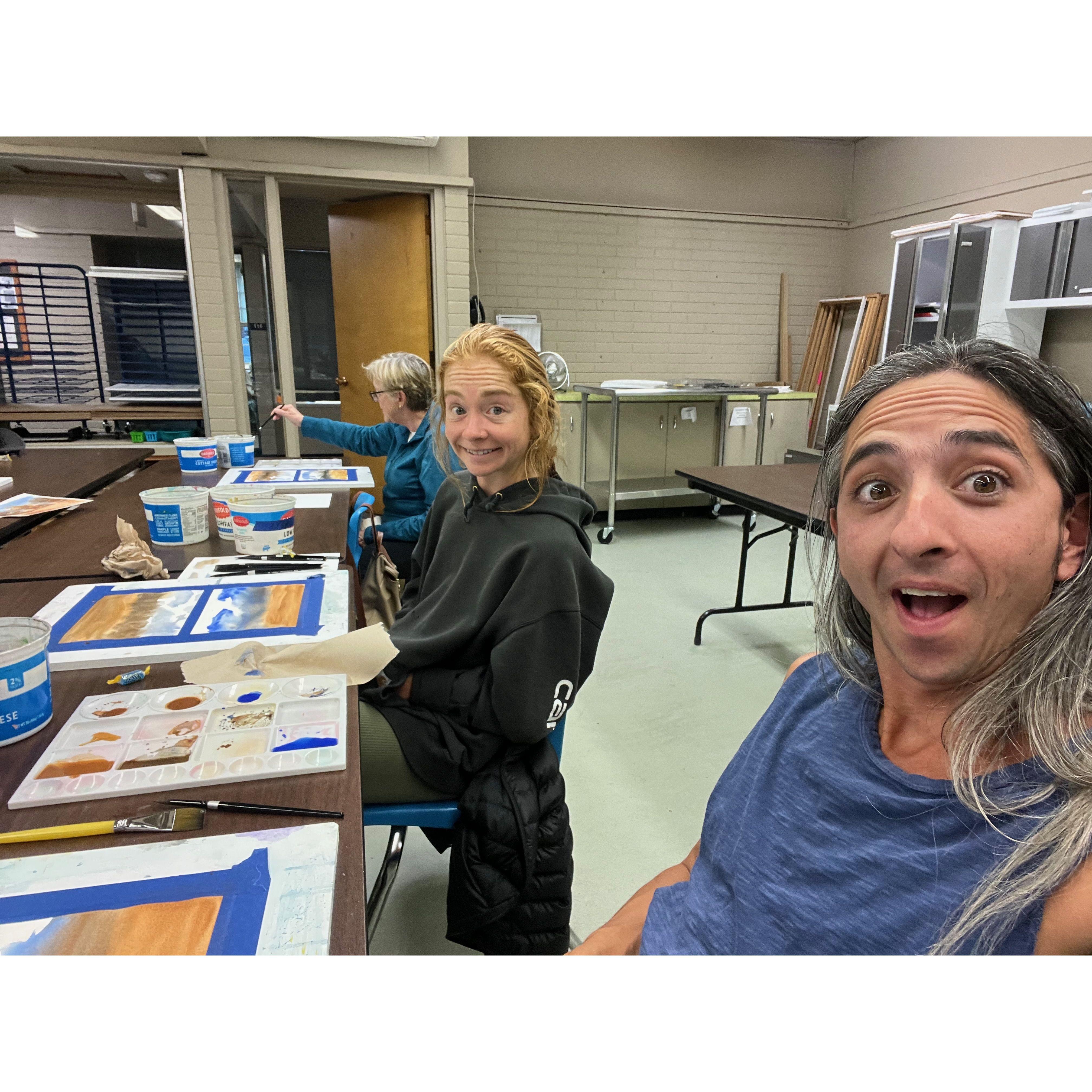 Bridget and Josh taking a painting class