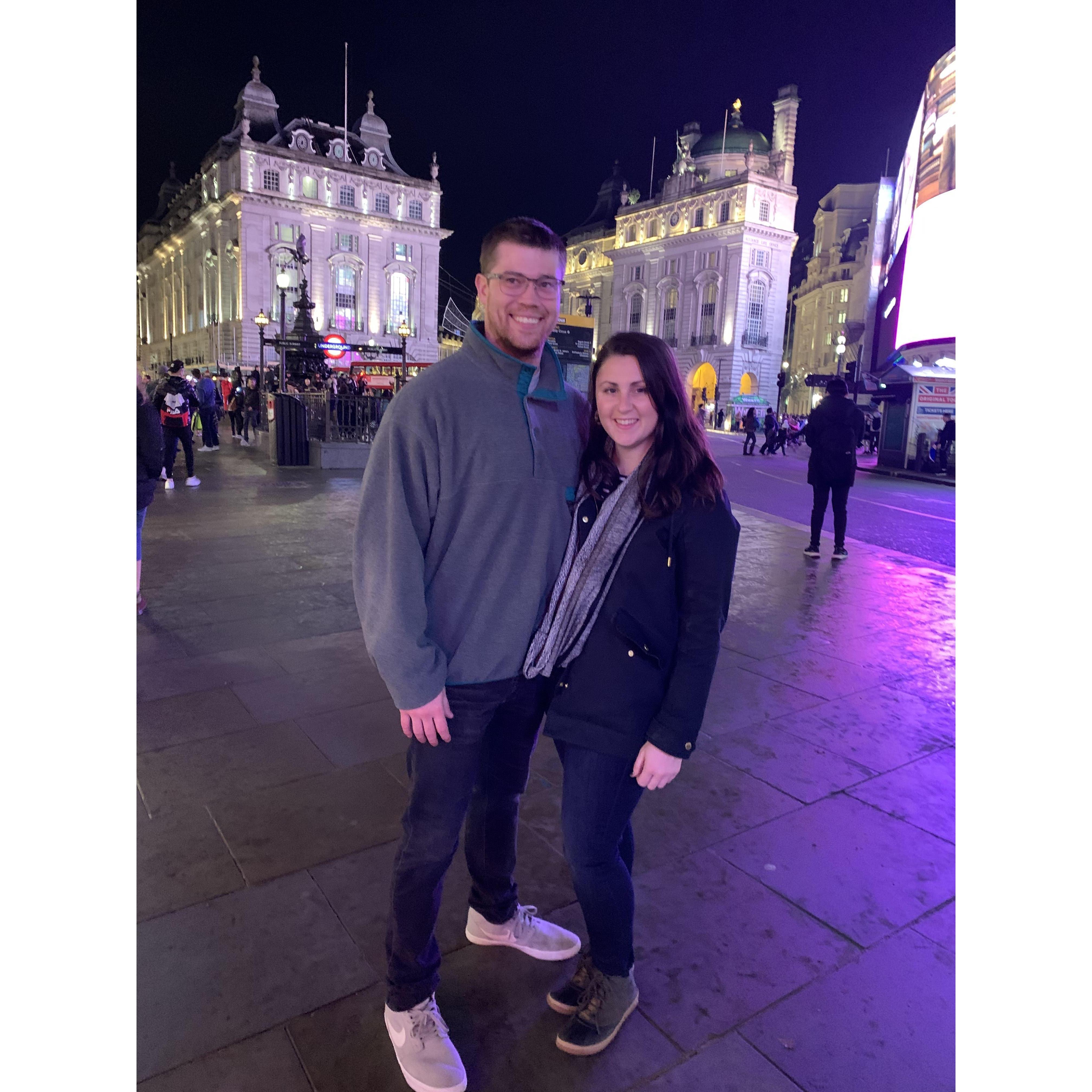 Jake showing us around Piccadilly Circus in London