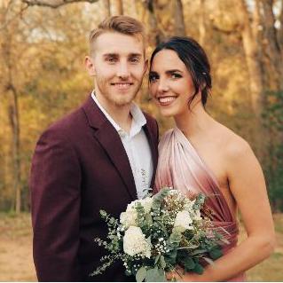 A more recent picture of us, at my little sisters wedding. Jake's beard growing attempt in full affect here.