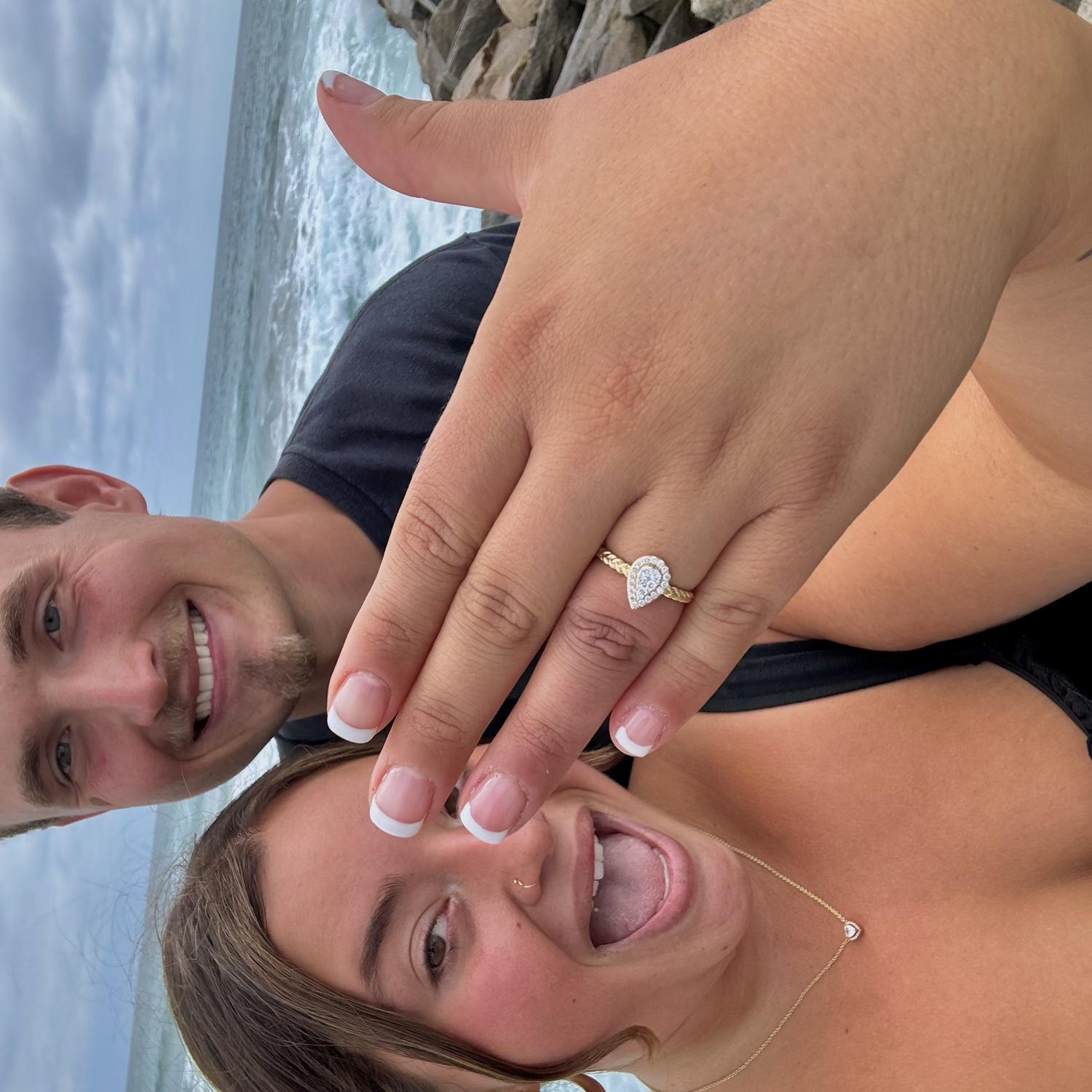 Freshly engaged— after some tears, Showing off the ring!