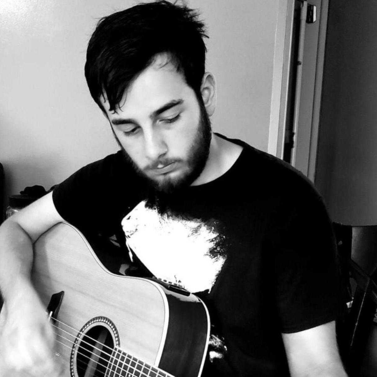 Logan Playing Guitar!