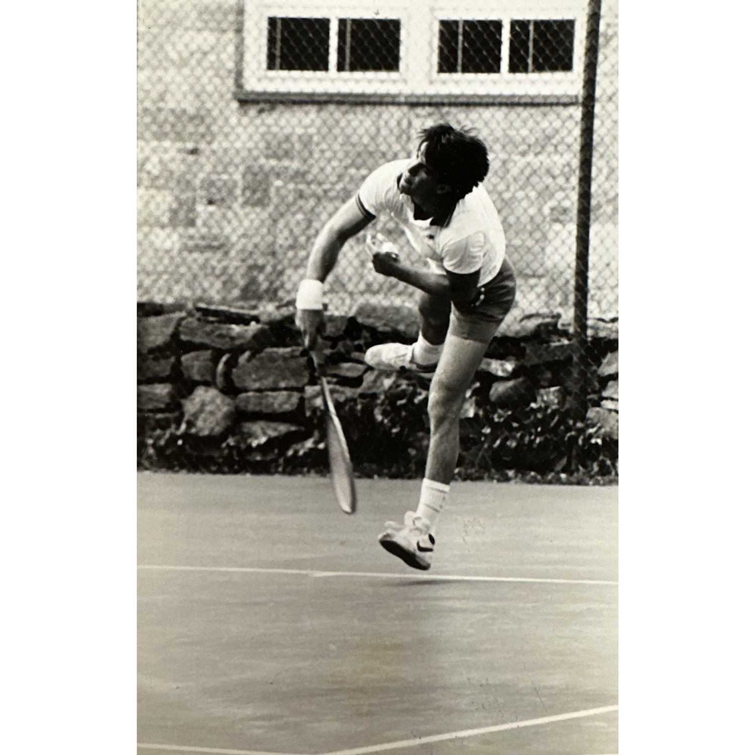 Middlebury College Men's Tennis. Note the bandage on left hand. Don't ask but he was in the school doctor's office late into prior night, having joined some friends in some rainy night trouble.