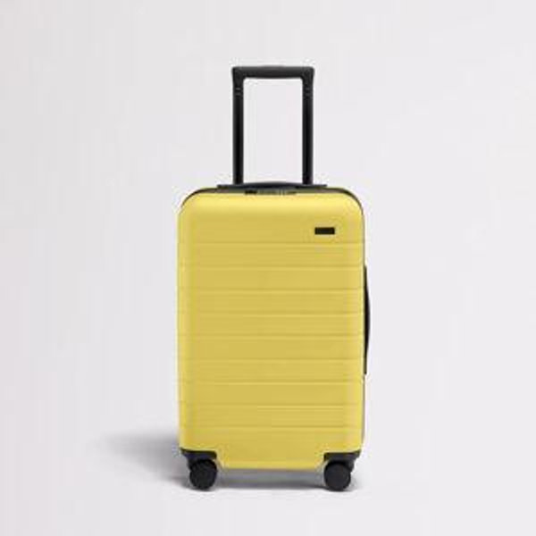 Away Carry-On Flex Suitcase in Sunshine Yellow