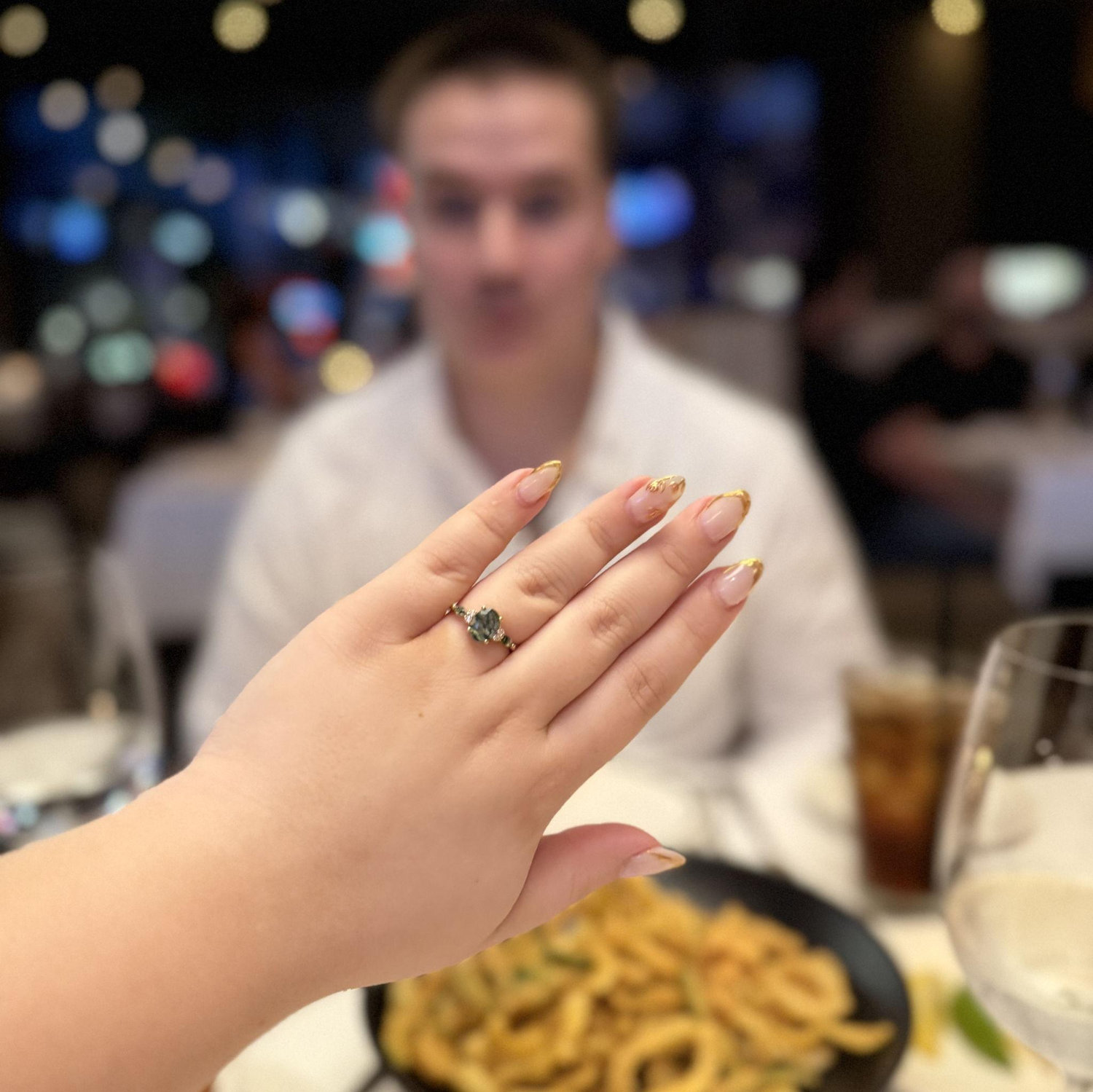 my ring taking over the post proposal dinner at one of our new favorite restaurants