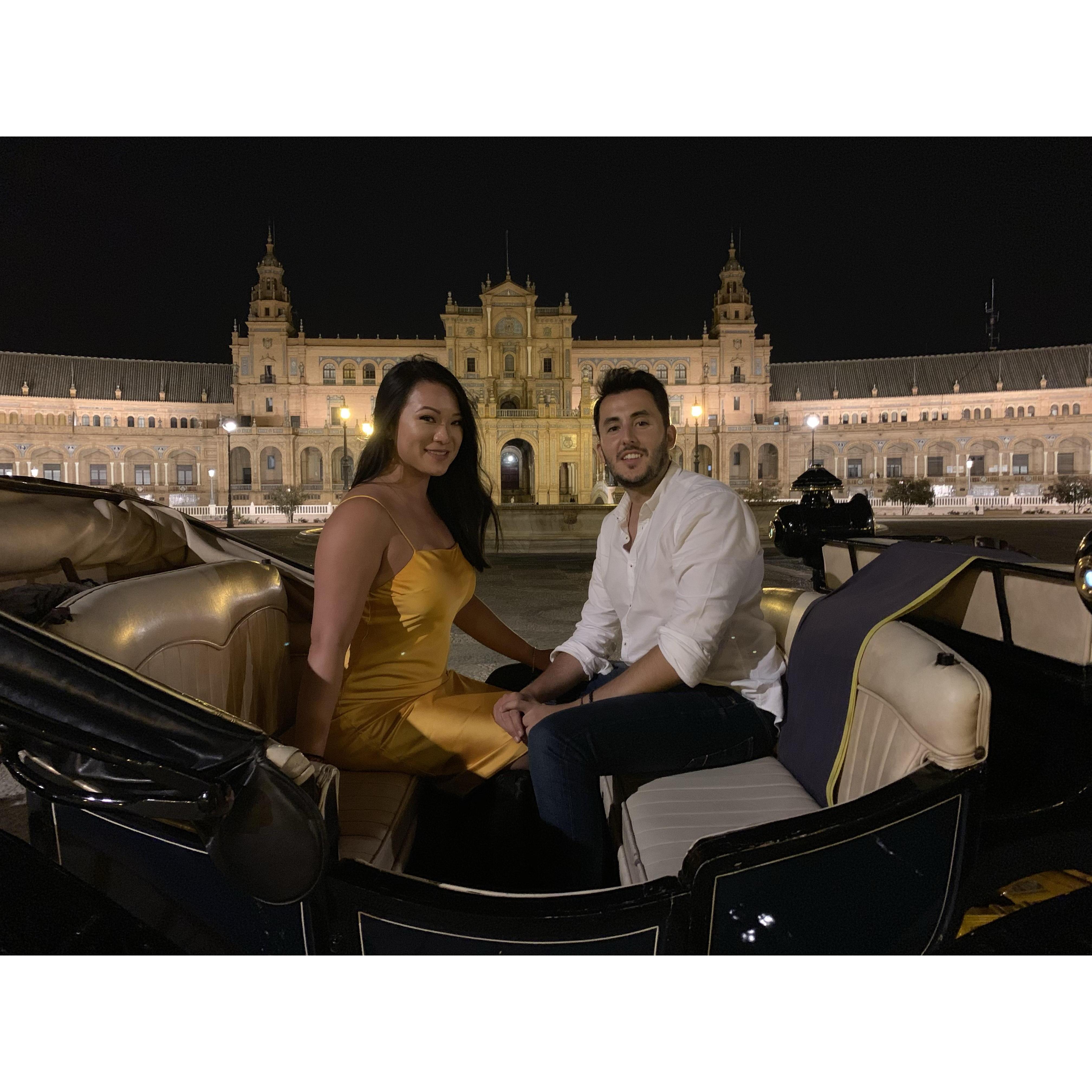 In Plaza De España on a horse carriage.