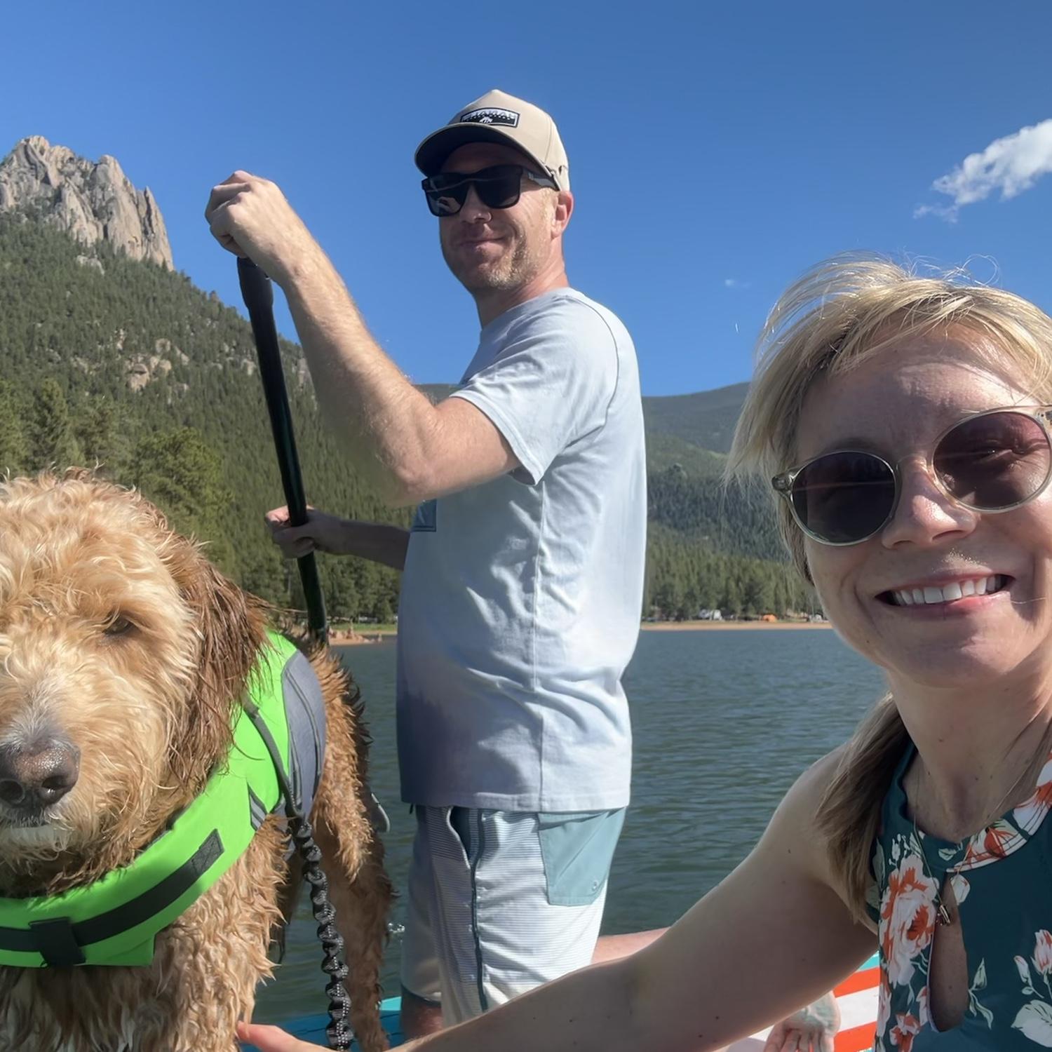 Paddle boarding with our buddy