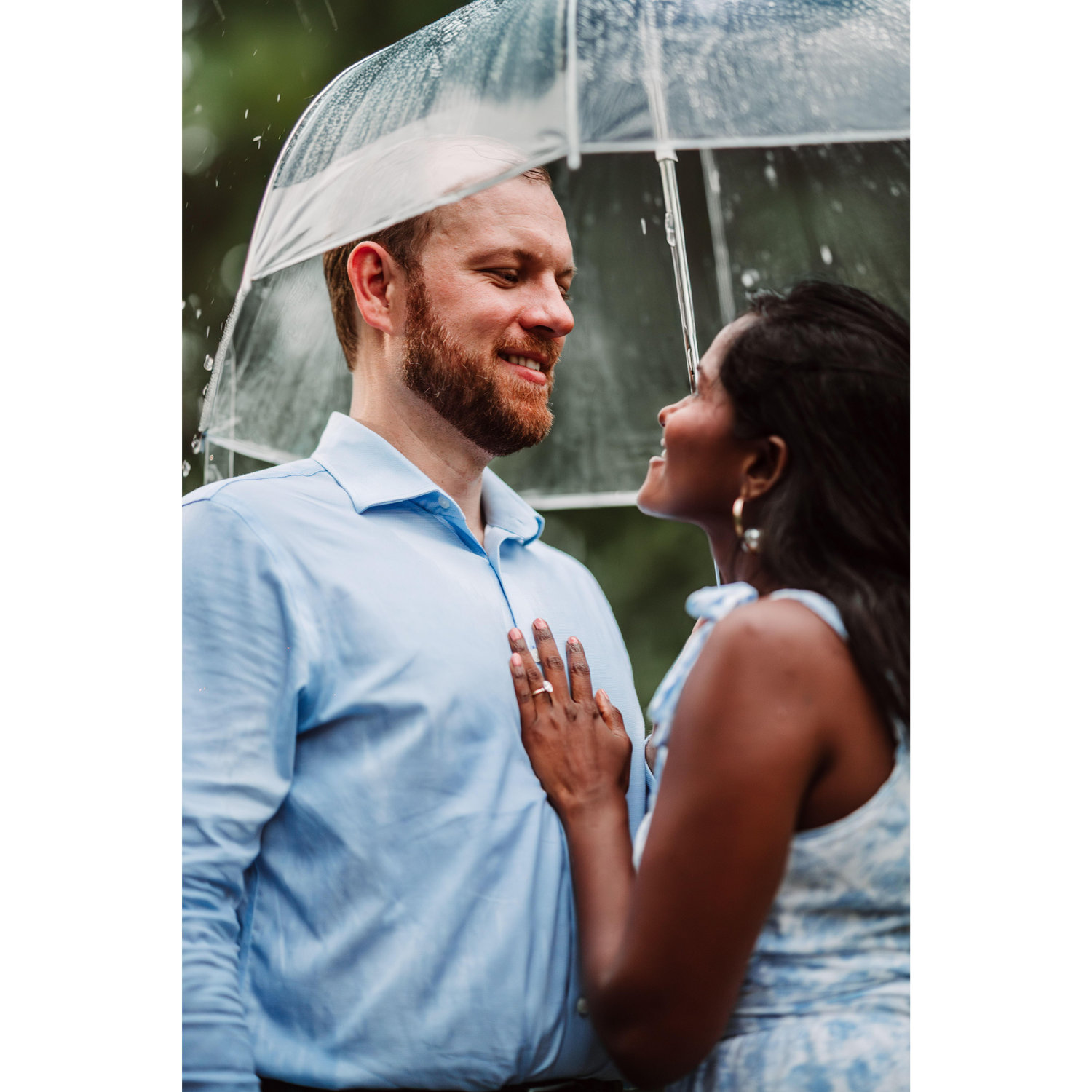 Made the best use of rain during engagement photoshoot