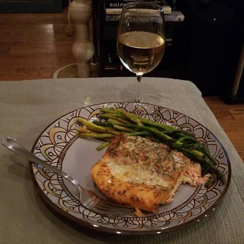 Our favorite home cooked meal! Salmon with Mediterranean seasoning from Aldi and asparagus. No meal is complete without Wine Shop at Home wine.